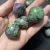 Import Bulk wholesale natural high quality ruby zoisite rough tumble healing stones quartz crystal oval shape gemstone from China