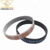 Debossed silicone wristbands with metal accessories