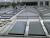Greenhouse solar powered instant roof flat plate solar water heater