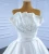 Import New design ivory  bridal gown ball sleeveless ball gown luxury pear  bead &satin wedding dress from China