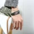 Import New Woven Leather Love Knot Rope Chain Chunky Stainless Steel Mens Leather Bracelet Multilayer Design from China