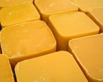 Physically processing natural honey bee wax