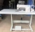 used juki8700l Sewing machine with table.