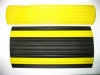 yellow & black rubber speed bump