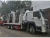 Import Sinotruck Howo 290hp 12 Tyre Flatbed Truck for load 24 tons Machinery With CLW brand 12ton fold crane from China