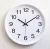 Import 12 inch 30cm round promotion or gift modern simple  brief plastic home decorative quartz wall mounted clock from China