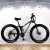 Import 26 inch snow mountain bike bicycle aluminum alloy thick rim 21 speed front fork shock absorber double disc brakes 4.0 tires from China