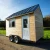 Import China professional manufacturer outlet small storage building sheds tiny homes on wheels for hot sale from China