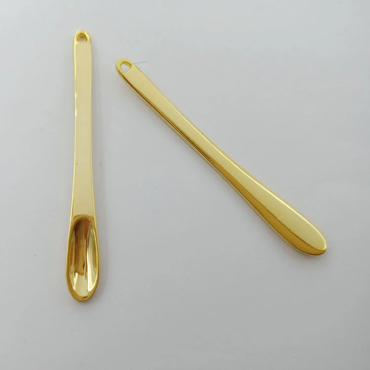 Cosmetic spatula gold cosmetic spatula