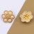 Import Elegant flower shape jewelry rhinestone decorative gold sewing button womens white pearl shank button from China