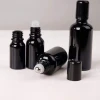 Hengjian 5ml 10ml 15ml 20ml 30ml 50ml 100ml shiny black glass roller bottle roll on ball essential oil perfume bottle with cap