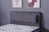 Modern double bed with hanging headboard hotel bed
