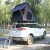 Import Playdo triangle aluminum shell van roof tent box rack 1-3 people hard roof top tent from China