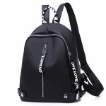 Small waterpoof nylon women backpacks with leather belt and words ribbon decoration