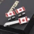 Import wholesale metal tie bar Canada flag shaped lapel pin men tie clips custom logo from China