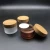Import Bamboo cosmetic jars 5g 30g 50g 100g 150g  round transparent amber glass cream jar with child resistant cap from China
