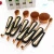 Import DW New Arrival Custom Logo Rose Gold/ Gold color Oval Cosmetics Brush Imported Wholesale Makeup from China