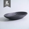 Factory supplies customized logo melamine matte restaurant oval shaped dinner plastic black charger plate