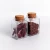 Import high quality 4oz small square spice glass jar with cork lid wood stopper bottle from China