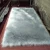 Import High quality synthetic faux fur sheepskin bedside mats fluffy faux fur rug from China