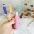 Import wholesale NEW ARRIVAL 10ml macaron color pink purple yellow sky blue glass bottle with white lid and crystal gemstone roller on from China