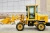 Import 1 ton mini wheel loader with grapple grass fork quick hitch for sale from China