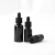 Import 30ml Matte Black Glass Bottle 1oz Black Glass Boston Round Dropper Bottle with Child Resistant Dropper from China