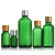 Import 5ml,10ml,15ml,20ml,30ml,50ml,100ml green essential oil bottle dropper glass bottle from China