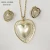 Import China stainless steel jewelry set charm gold earring and pendant jewelry set for ladies from China