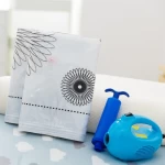 Clothing compression storage vacuum bag with valve