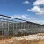 Import Large size commercial glass  greenhouse with hydroponics system from China