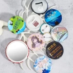 Most popular Yiwu VOGRACE cartoon anime factory directly tin badge hot sale cheap security tinplate button badges for clothes