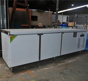 Refrigerated table under counter chiller with three solid steel doors