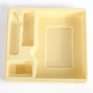 Thermoformed flocked blister packaging tray