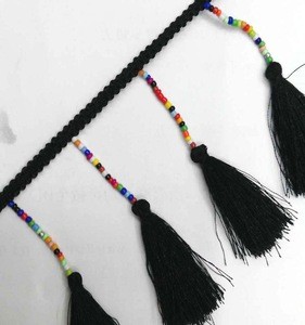 beaded trimming with black tassel