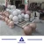 Import Cheap Granite Round Rolling Stone Ball Wheel Stopper Natural Garden Stone from China