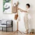 Import Custom Solid wooden floor stand tree 8 hooks clothes hanger rack for bedroom office from China