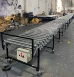 Electric expandable conveyor system roller conveyor