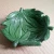 Import Mettle New Arrival High Quality Green Leaf Weed Resin Ashtray For Table Decoration from China