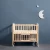 Import OEM Multi-functional solid wood baby crib with wheels storage drawer kids bed from China