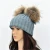 Import SF0329 Double pom pom beanie women winter hats with two fur balls hat from China