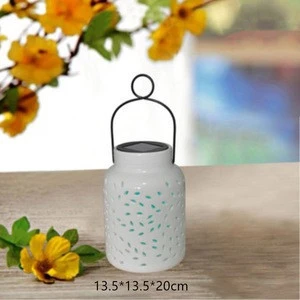 Solar ceramic patio garden lantern with changing color LED light