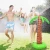 Import Spot inflatable coconut tree sprinkler game toy beach pool party sprinkler toy from China