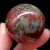 Import Wholesale Natural Dragon Blood Stone Quartz Crystal Polished balls Treatment from China