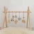 Import Wooden Baby Play Gym With Crochet Animal Toy Eco-friendly Deer and Bear Baby Play Gym from China