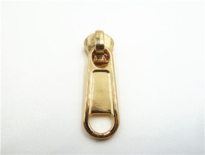 Zipper slider with straight pointed end with hole