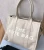 Import 2022 fashion custom logo Premium printing canvas traveler women tote bag from China
