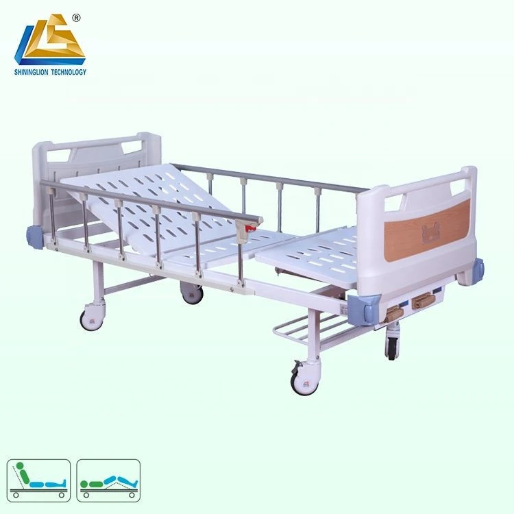 Manually operated hospital bed with side rail
