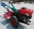 Import 12HP farm machinery mini hand tractor price from China
