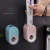 Import Automatic Toothpaste Dispenser Set with Wall Mounted Hands Free Toothbrush Holder Toothpaste Automatic Pill Dispenser from China